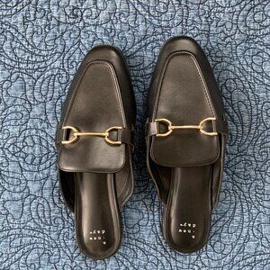 Black slide-on buckle loafers
